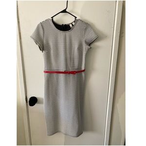 White & black pencil dress with red waist belt, size small.